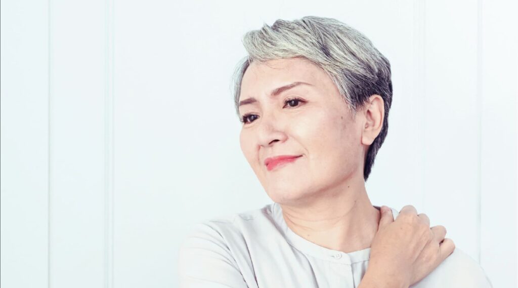 Senior Woman – having chronic back pain